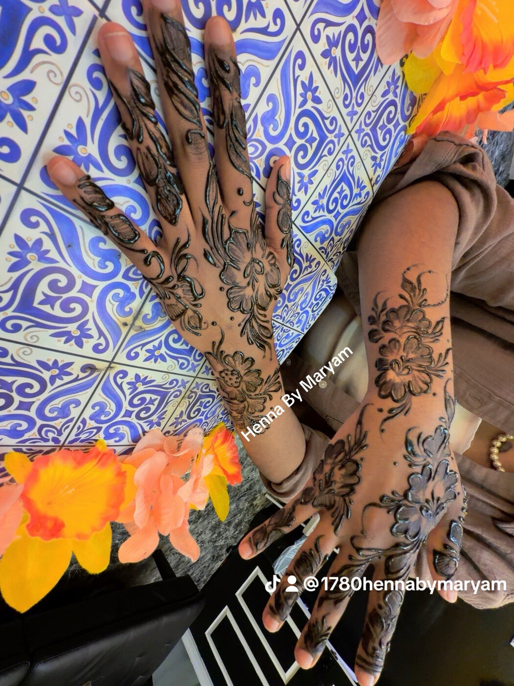 Shaded floral arms henna