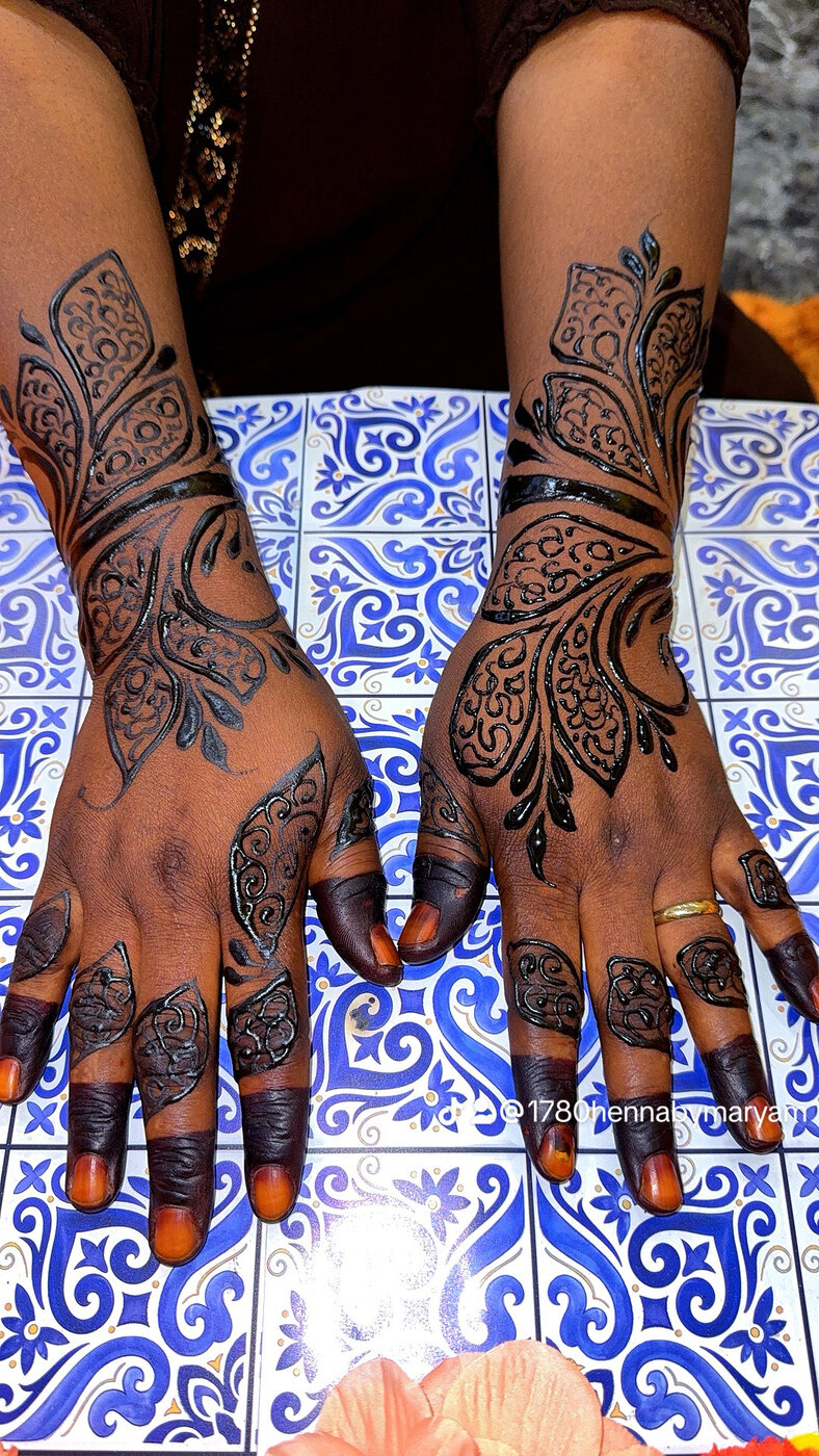 Twin floral arms henna