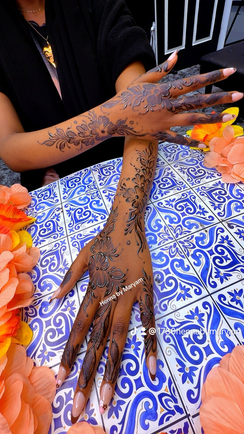Red mehndi arms henna