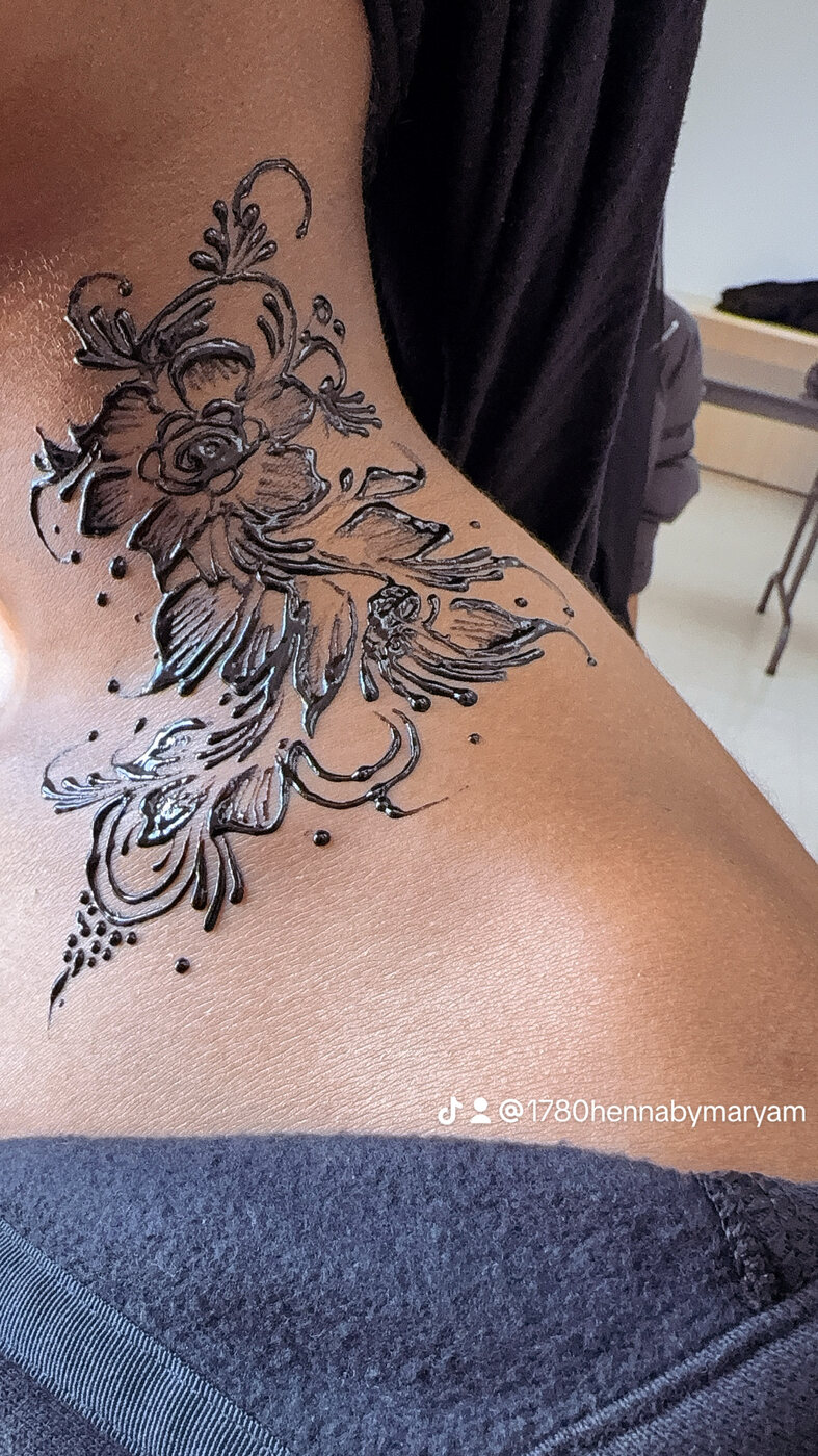 Neck and shoulder floral henna
