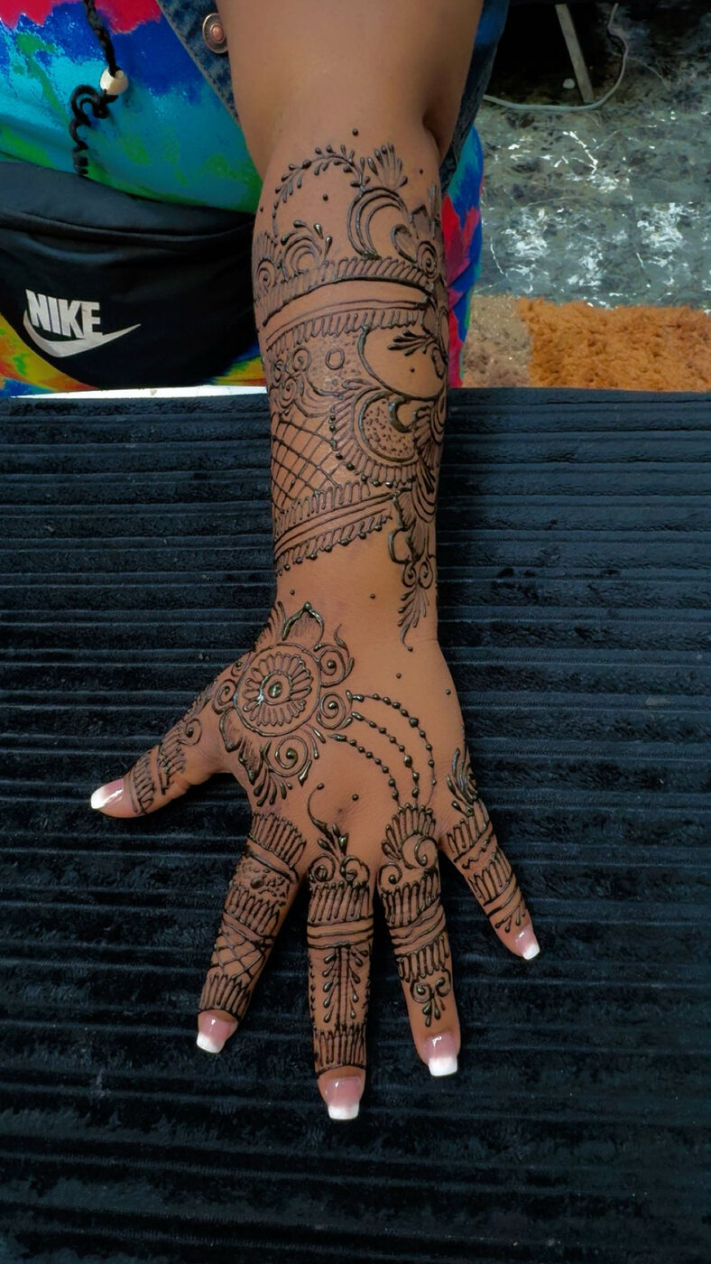Ornate forearm henna