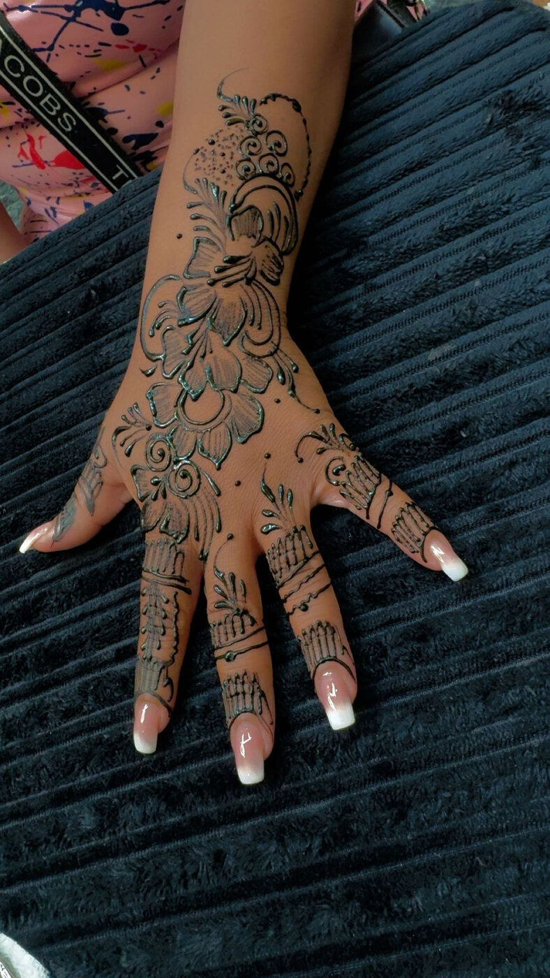 Peacock fan hand henna